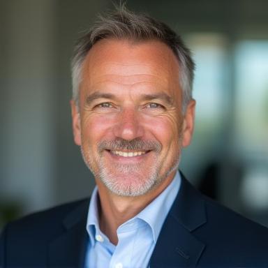 Professional headshot of Dr. Andreas Müller.